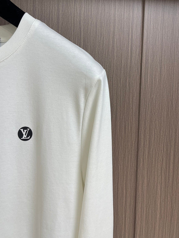 Full styled look of Louis Vuitton luxury clothing with tailored silhouette