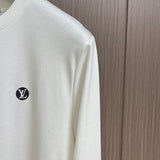 Full styled look of Louis Vuitton luxury clothing with tailored silhouette