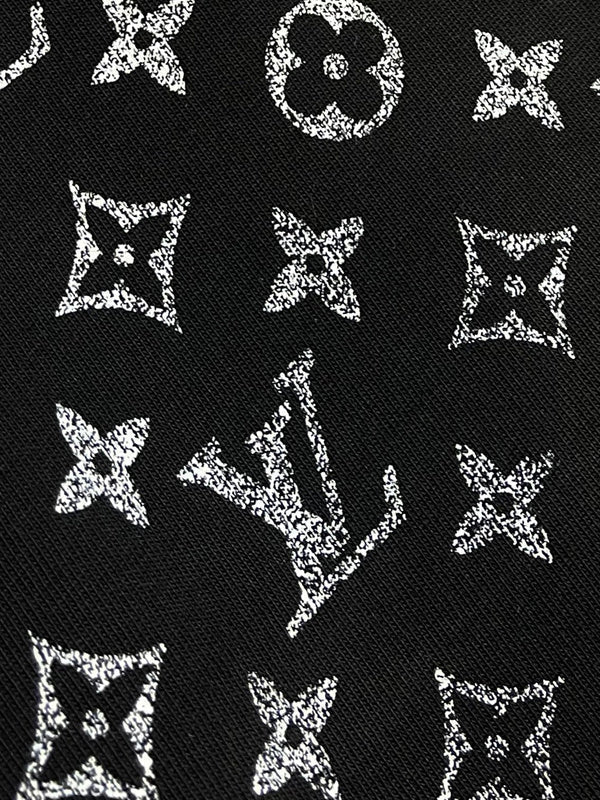 Flat lay presentation of Louis Vuitton cotton t-shirt with logo-detail design