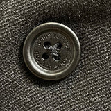 Flat lay presentation of Louis Vuitton luxury clothing with signature branding
