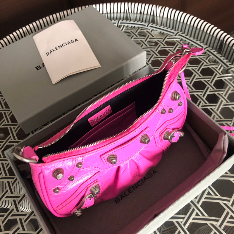 Front view of modern polished women's handbag – women's designer-style accessory