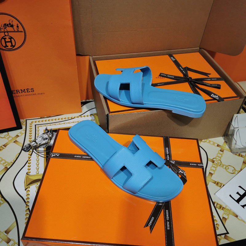 Hermès Nude Slide Sandals - Lifestyle Styling Shot