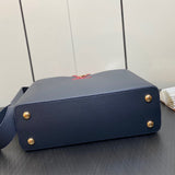  minimalist top-handle bag detail view showing craftsmanship 26