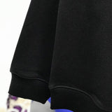 Close-up detail shot of Louis Vuitton luxury clothing with runway-inspired design