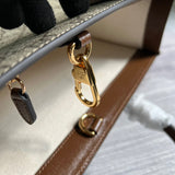Close-up detail of polished structured women's handbag – women's everyday handbag