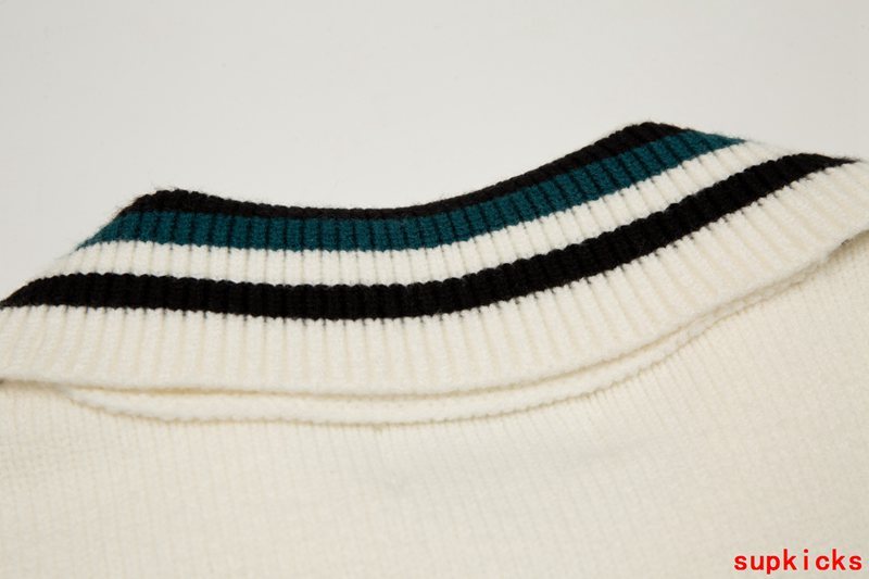 Close-up detail shot of Rhude luxury clothing with signature branding