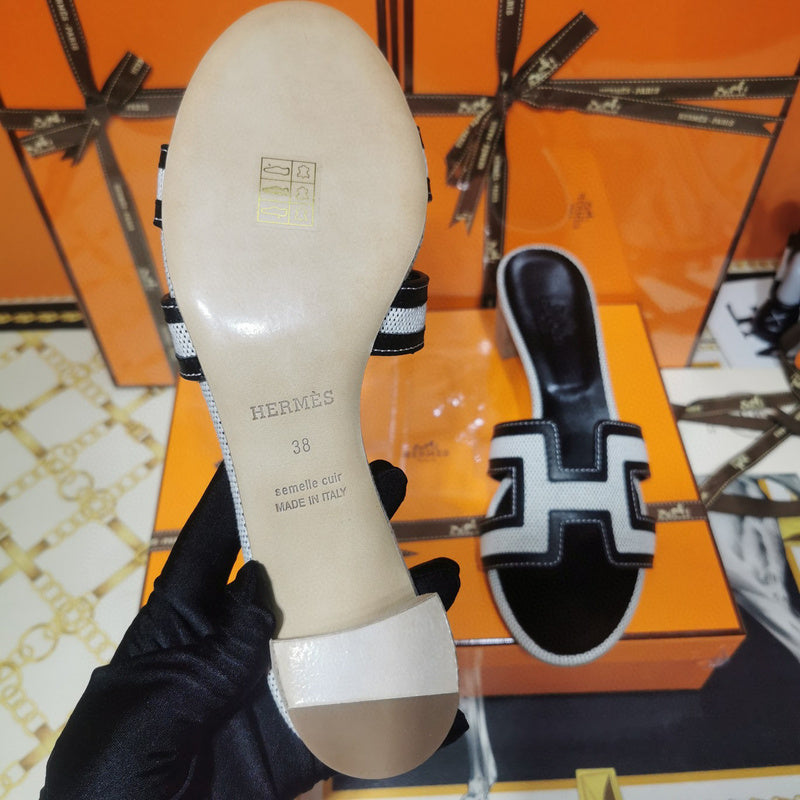 Hermes sandals Style 054 - angled studio shot