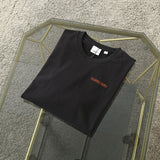 Burberry t-shirt close-up — premium authentic designer style