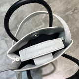 Bold Premium PU Leather Handbag - Smooth Faux-Leather Exterior | Women's Statement Accessory #1057 - texture close-up (image 9) of designer-inspired handbag