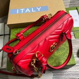 Styled lifestyle shot of modern signature women's handbag – women's luxury accessory