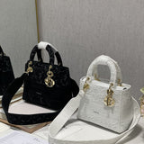 Front view of chic classic women's handbag – women's designer-style accessory