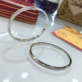 Front view of Cartier unisex jewelry piece