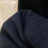 Side profile of Louis Vuitton luxury clothing with monogram-inspired silhouette