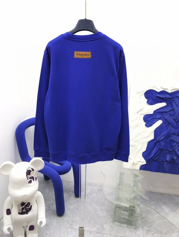 Back view of Louis Vuitton luxury clothing with runway-inspired design