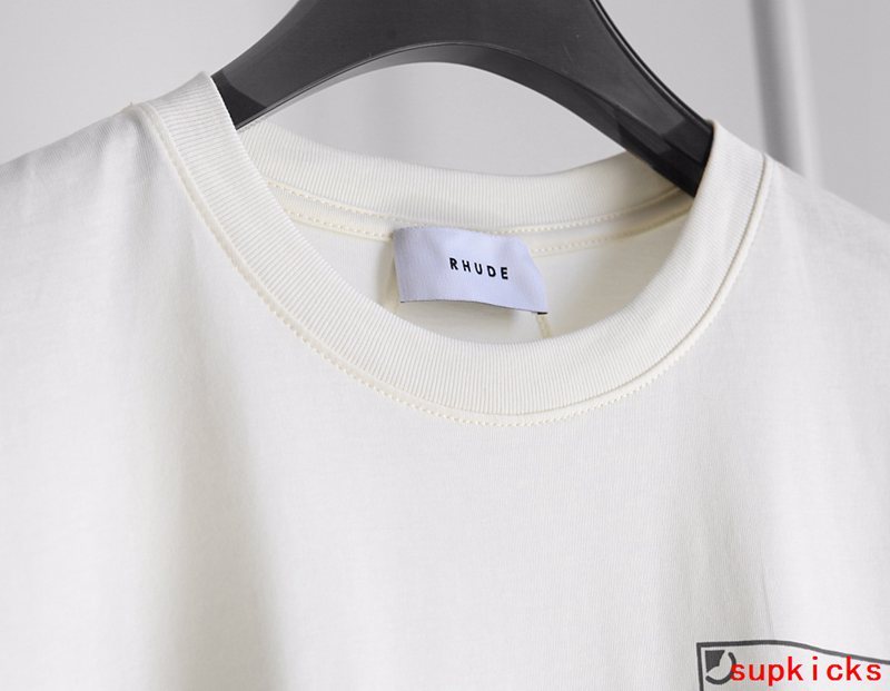 Flat lay presentation of Rhude luxury clothing with contemporary cut