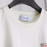 Flat lay presentation of Rhude luxury clothing with contemporary cut