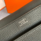 Side view of sleek structured handbag
