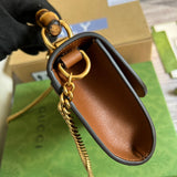 Side profile of elevated refined women's handbag – women's luxury accessory