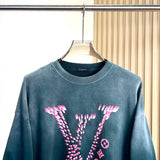 Close-up detail shot of Louis Vuitton luxury clothing with everyday silhouette