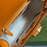 Side view of minimalist structured handbag