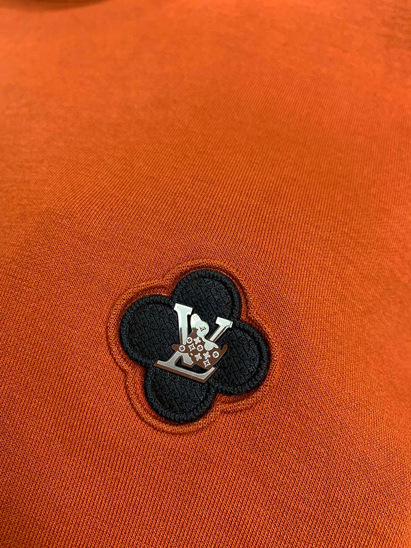Front view of Louis Vuitton luxury clothing with monogram-inspired silhouette