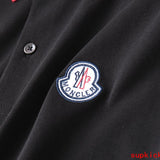 Side profile of Moncler luxury clothing with monogram-inspired silhouette
