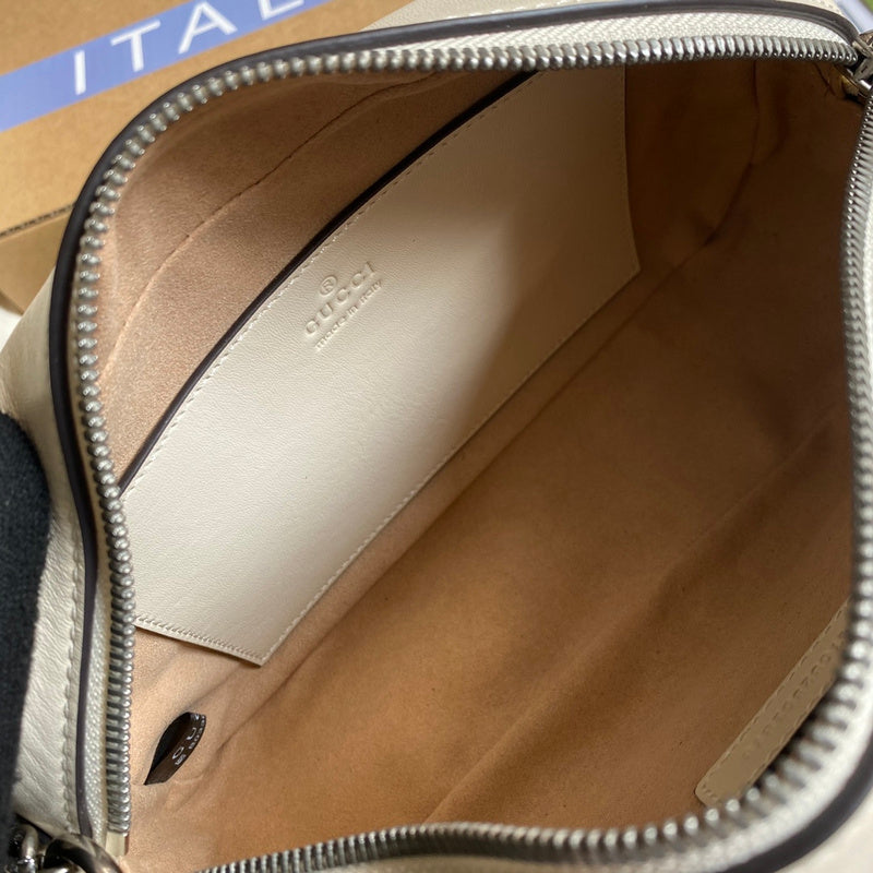 Close-up detail of polished elevated women's handbag – women's statement bag