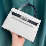 Side view of understated structured handbag
