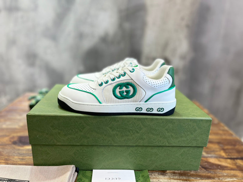 Side profile of Gucci clean off-white sneakers classic court silhouette