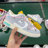 Nike Designer sneakers in crisp white retro runner design front view
