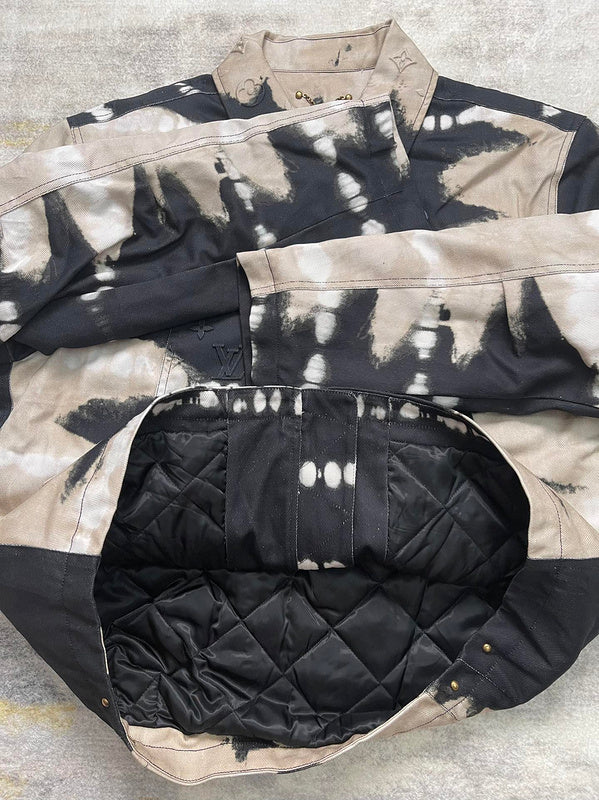 Full styled look of Louis Vuitton luxury clothing with label-forward styling