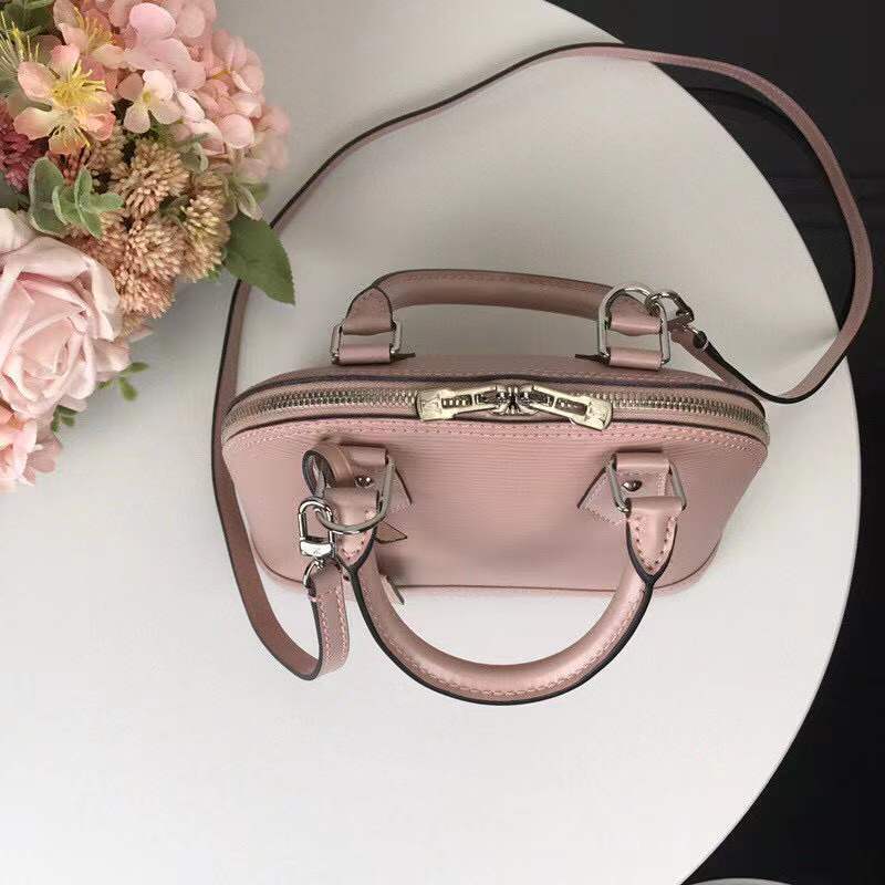 Styled lifestyle shot of chic everyday-luxe women's handbag – women's designer-style accessory