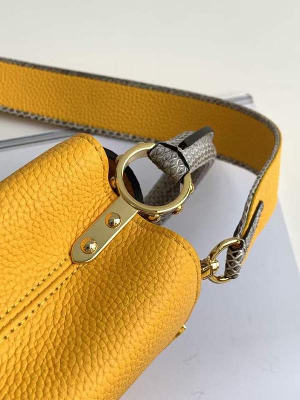 Handle and strap detail of signature classic women's handbag – women's statement bag