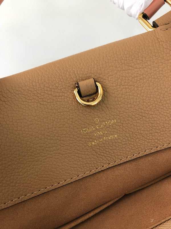 Side profile of chic signature women's handbag – women's luxury handbag