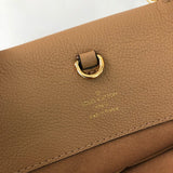 Side profile of chic signature women's handbag – women's luxury handbag