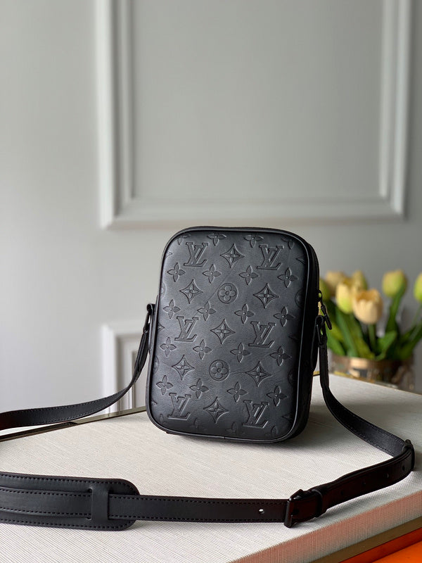 Close-up detail of structured signature women's handbag – women's premium purse