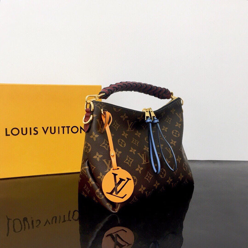 Handle and strap detail of premium statement women's handbag – women's luxury handbag