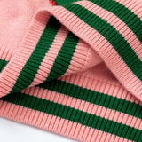 Side profile of Gucci luxury clothing with logo-detail design