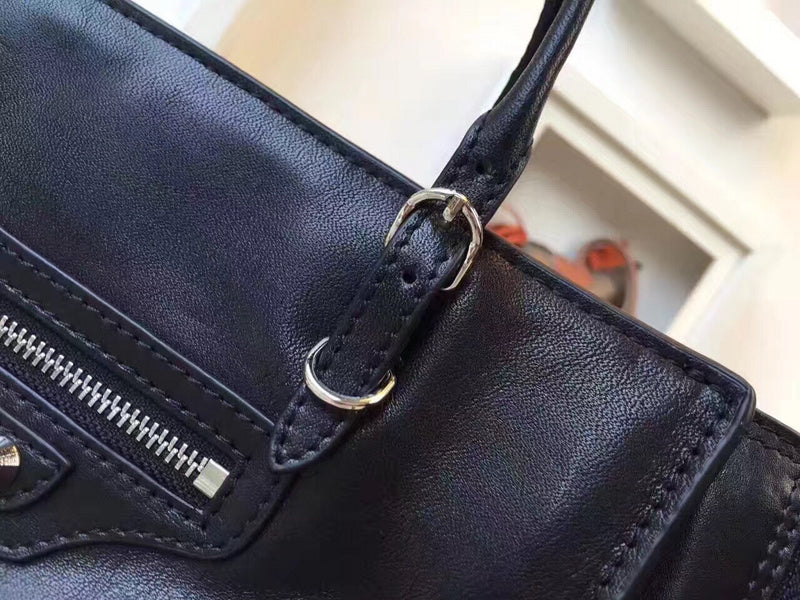 Understated Premium PU Leather Handbag - Statement Silhouette | Women's Statement Accessory #972 - styled full view (image 7) of designer-inspired handbag