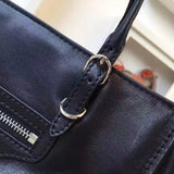 Understated Premium PU Leather Handbag - Statement Silhouette | Women's Statement Accessory #972 - styled full view (image 7) of designer-inspired handbag