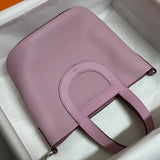 Side view of clean-lined structured handbag