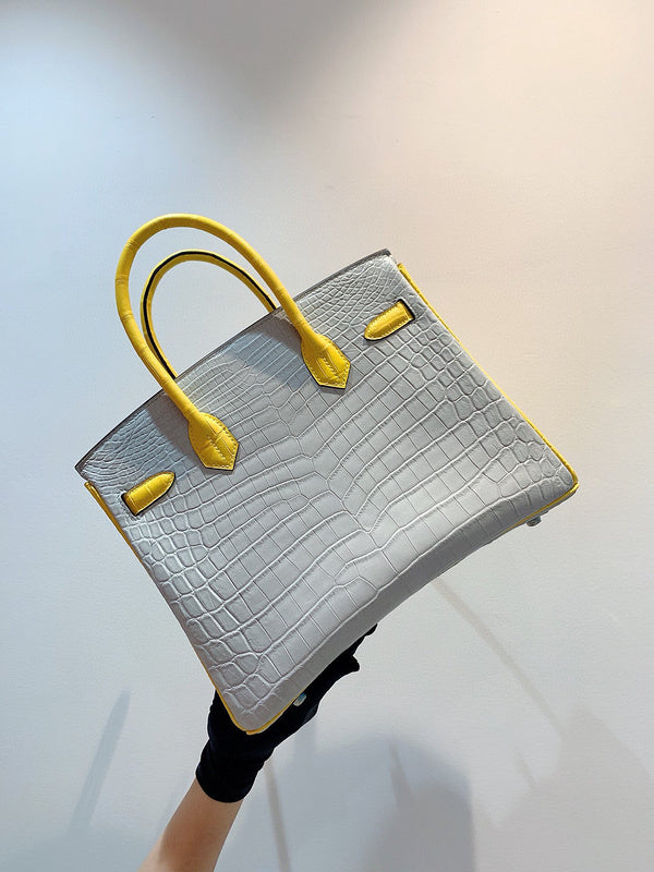 Side view of smart structured handbag