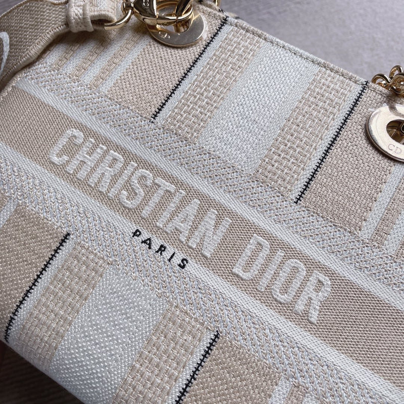 Back view of polished classic women's handbag – women's luxury accessory