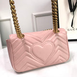 Back view of classic refined women's handbag – women's statement bag