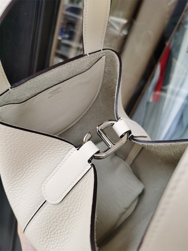  Sleek structured bag carried on shoulder 22