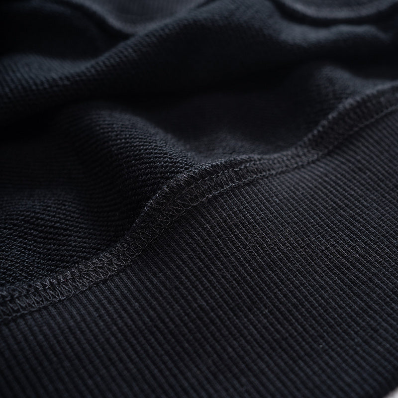 Close-up detail shot of Louis Vuitton luxury clothing with streetwear-inspired cut