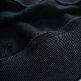 Close-up detail shot of Louis Vuitton luxury clothing with streetwear-inspired cut