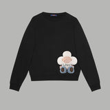 Front view of Louis Vuitton luxury clothing with signature branding