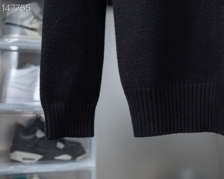 Close-up detail shot of Louis Vuitton luxury clothing with signature branding