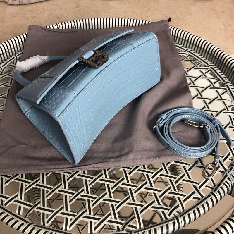 Back view of polished classic women's handbag – women's luxury accessory